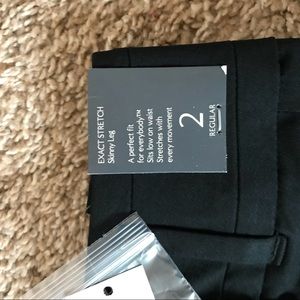 Exact stretch skinny leg black pants size 2